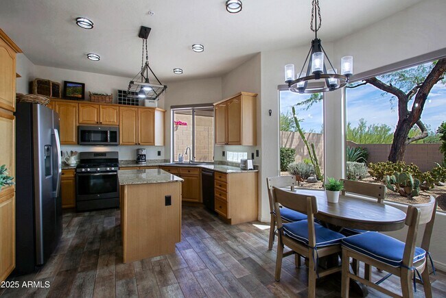 Building Photo - 6879 E Amber Sun Dr