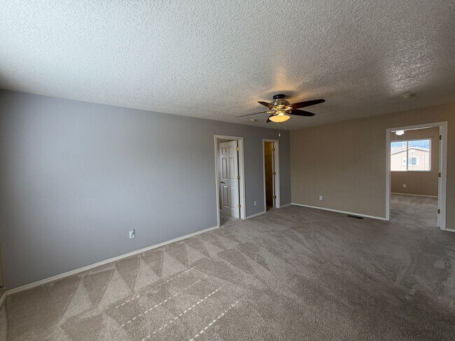 Building Photo - 4 Bedroom Home Available Near McMahon Blvd NW & Universe Blvd NW!