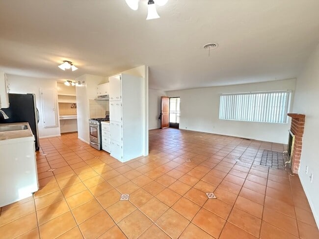 Building Photo - College View Estates Gem – Spacious 3BR Home with Private Yard & RV Parking