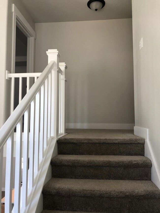 Building Photo - AMAZING HOME IN SOUGHT AFTER EXCHANGE DEVELOPMENT W/ 2 CAR GARAGE