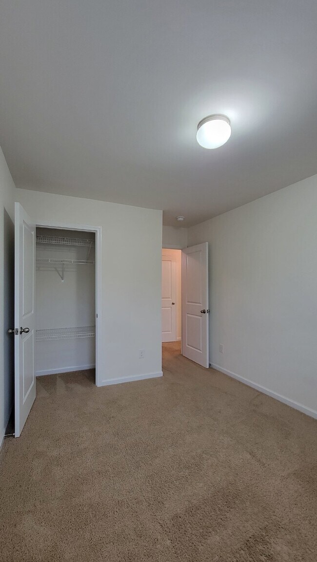Building Photo - "Modern 3-Bedroom Multiplex with 3 Full Ba...