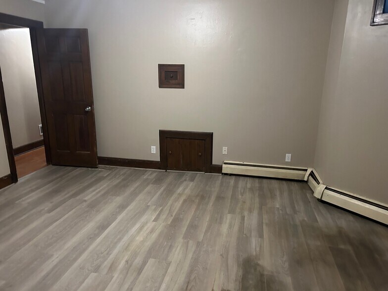 Larger Bedroom in lower level - 2432 Stevens Ave