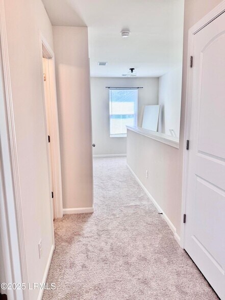 Building Photo - 23 Island Breeze Ln