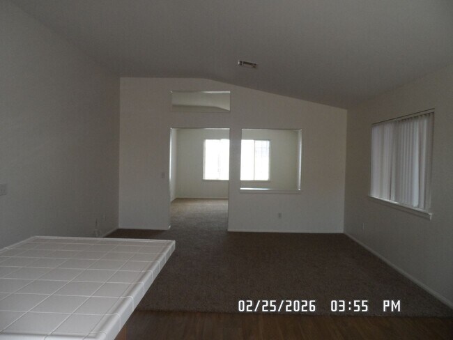 Building Photo - 3 Bedrooms, 2 Bathrooms, Approx 1582 sq. ft., 2 Car Garage, Fenced Back Yard, Rock-scaped Front Y...