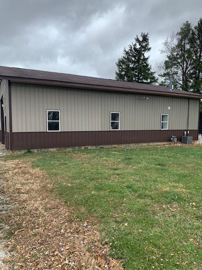 Building Photo - Two bedroom with oversize attached garage