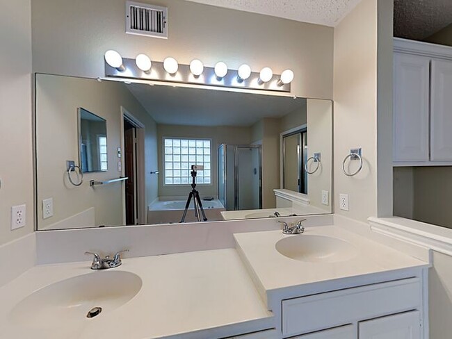 Building Photo - Move in before May 1st and get $1,000 OFF ...