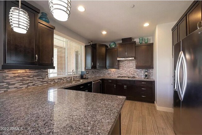 Building Photo - 10260 E White Feather Ln