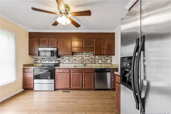 Building Photo - 6837 Woodmark Dr