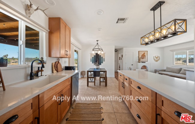 Building Photo - Updated 3 Bed 2 Bath Home on 2.5 Fenced In Acres with paid SOLAR PANELS!!