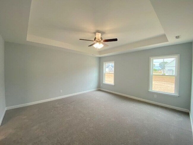 Building Photo - SPACIOUS 4 Bedroom | 2.5 Bathroom in Stone...