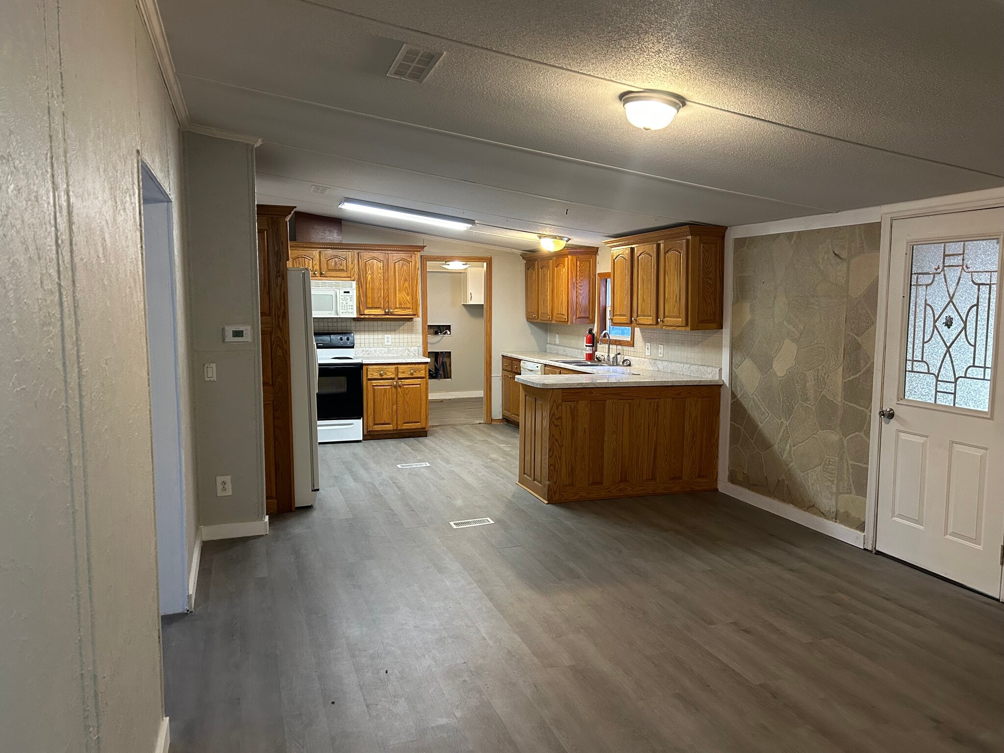 Dinning Room into Kitchen - 503 Vanzant Rd