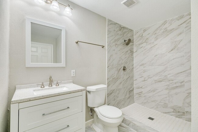 Building Photo - Recently Renovated 4-Bedroom Home with Mod...