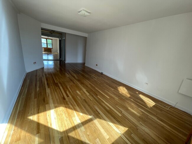 Living Room view toward bathroom - 67-30 Dartmouth St