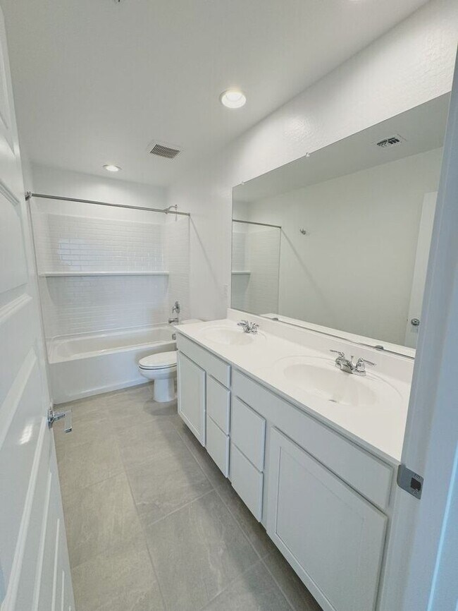 Building Photo - MOVE IN SPECIALS!! New 5-Bedroom Home in P...