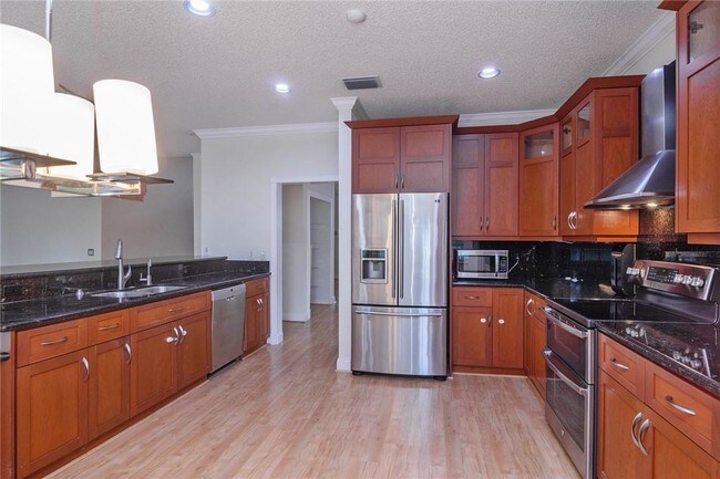 Building Photo - 4102 Pinewood Ln