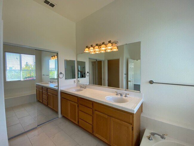Building Photo - Castlerock Gated Community off Hilborn! Be...
