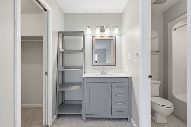 Building Photo - Contemporary design meets exceptional space in this inviting ground level residence, offering eff...