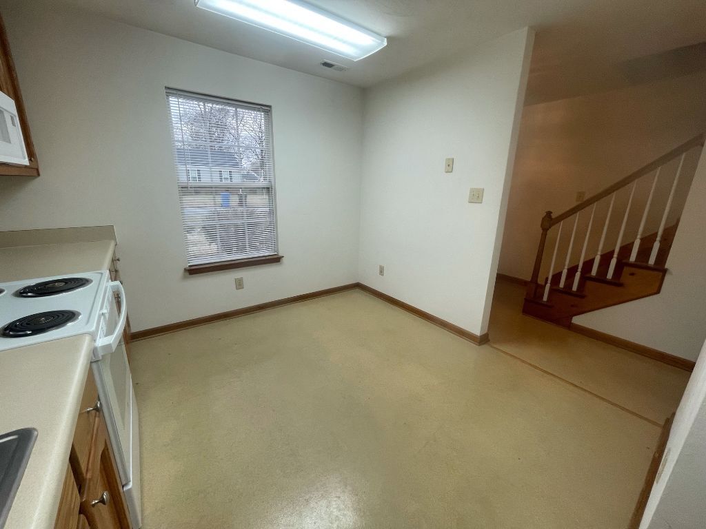 Photo Before New Kitchen Floor - 2066 Iowa St