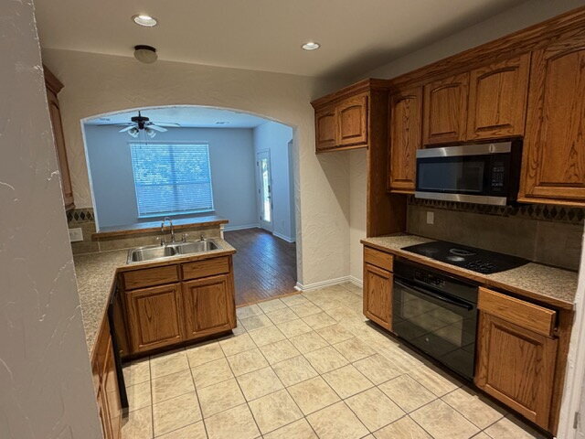 Building Photo - Former model home on corner lot is ready for move in!