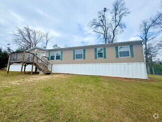 Building Photo - Spacious Mobile Home in a Peaceful Setting