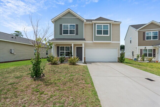 Building Photo - 4 Bedroom, 2.5 baths, with a 2 car garage located in Shell Point Farm.