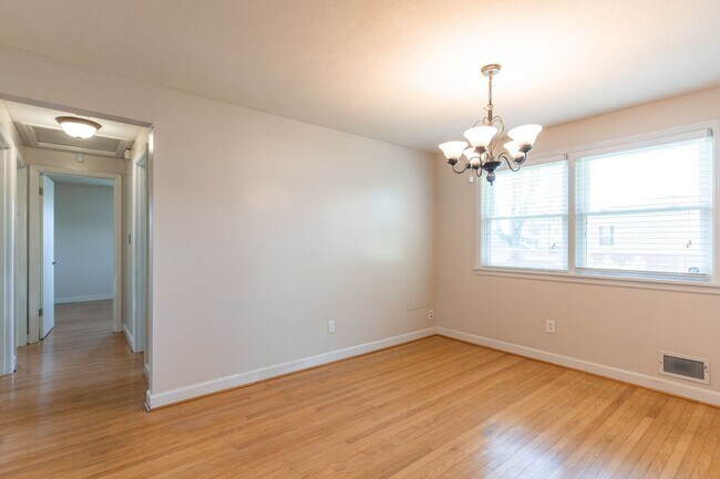 Building Photo - Welcome to this charming 3-bedroom, 2 full...