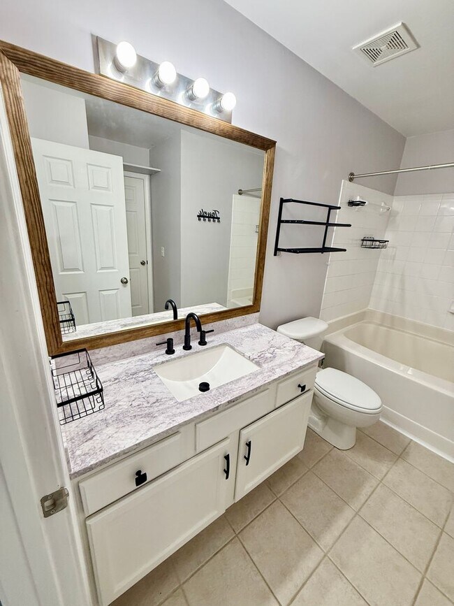 Building Photo - Convenience Meets Privacy – Updated 2BR Condo Minutes from Marina & Shopping! $1600/mo