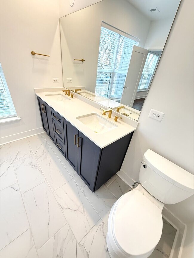 Building Photo - Brand new 4 level, 4 Bedroom Townhome with Elevator!