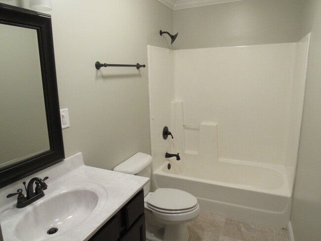 Building Photo - 4 Bedroom, 3 Bath Basement Ranch with Coun...