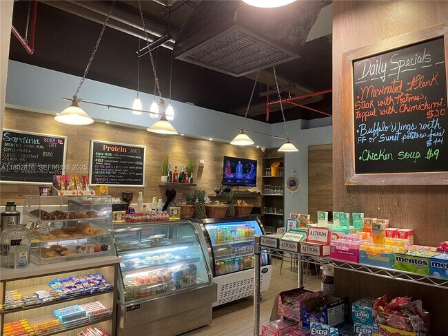 Building Photo - 10275 Collins Ave