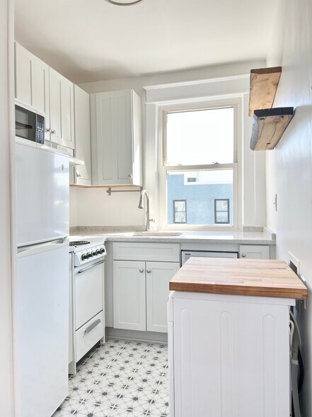 kitchen with butcher block detail over W/D - 1451 Pennsylvania Ave SE
