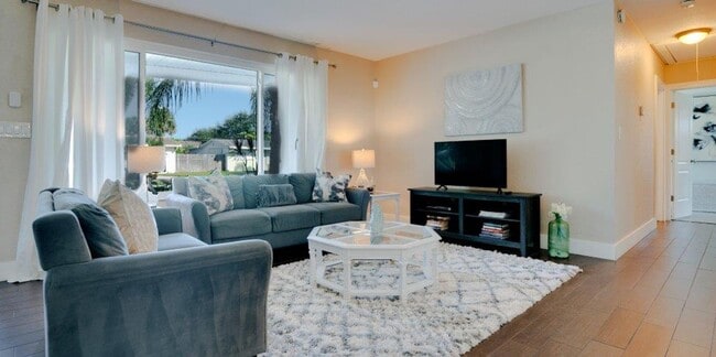 Building Photo - Step Into Sunshine: Modern Charm Meets Coa...