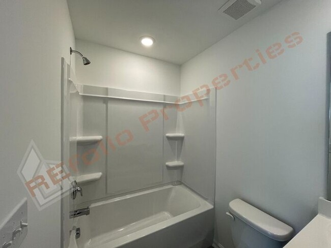 Building Photo - Brand New 2BR/3BA Townhome in Prime Apex L...