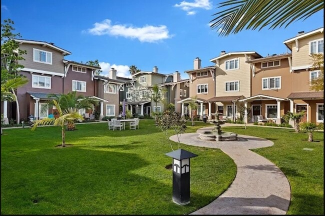 Building Photo - Live Upstairs, Work Downstairs: Rare Versatile Carpinteria Craftsman Townhouse!