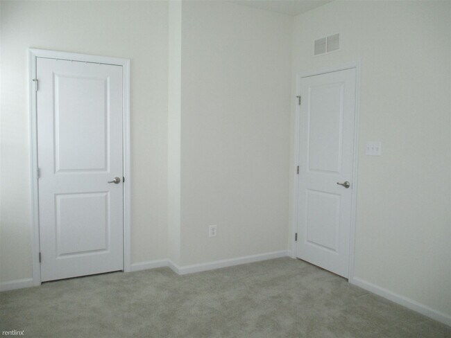 Building Photo - 2 br, 2.5 bath Townhome - 7731 Duncannon Ln