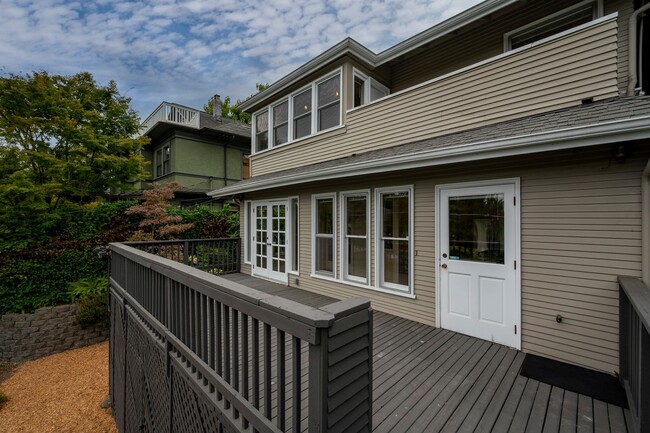 Building Photo - Traditional Four-Corner Craftsman Home on ...