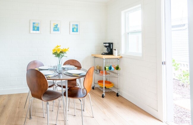 Building Photo - Enjoy stunning sunsets and beach living at its finest, Short Walk to Beach