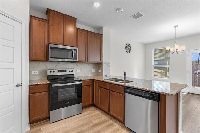 Building Photo - 7705 Song Sparrow Dr.