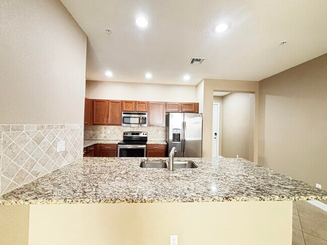 Building Photo - 9480 SW Merlin Ct