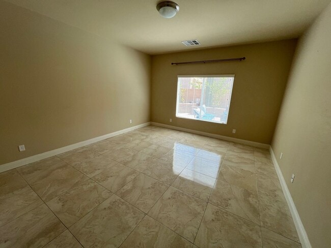 Building Photo - A Fantastic 4 Bedroom Home with the primary Downstairs, in Silverado Ranch