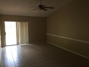 Building Photo - 2 bed 2 bath with Fenced in backyard!