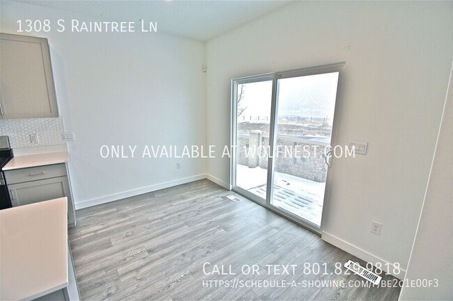 Building Photo - 1308 S Raintree Ln