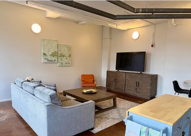 Living Room with TV - 116 S Gay St