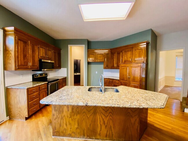 Building Photo - {8514}  Village of Kensington + Finished B...