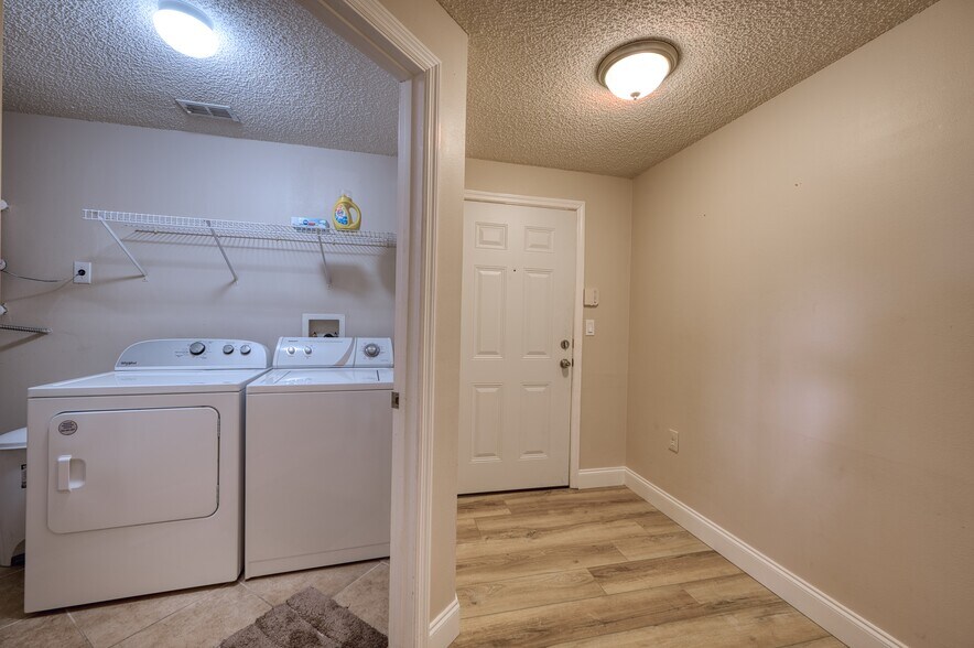 Laundry and Foyer - 5551 Bentgrass Dr