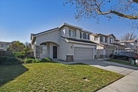 Building Photo - OPEN & SPACIOUS, 4 BEDROOM, 3 BATH 2 STORY...