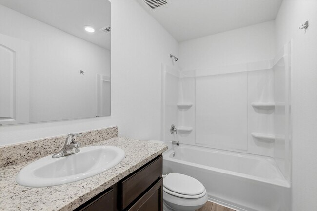 Building Photo - Clean & Modern Townhome with No Carpet and Lawn Service Included