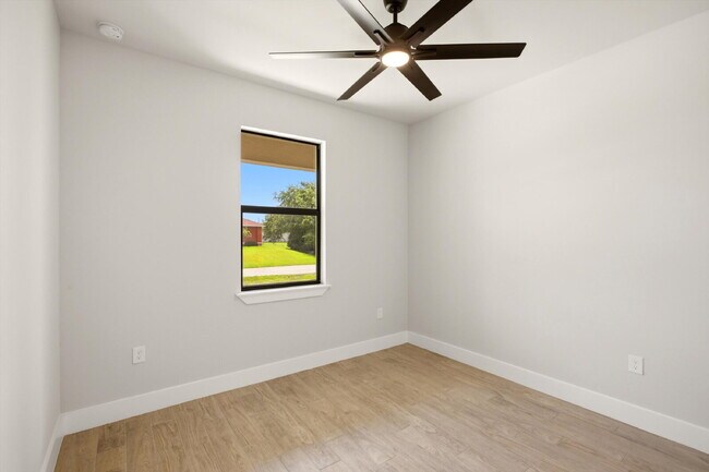 Building Photo - New 3/2 Pool Home for Rent on Canal, Fenced Yard, Pets Welcome. Your Dog Approves of This Backyard
