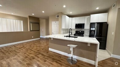 Building Photo - SPECIOUS 2 BED 2 BATH CONDO WITH ATTACHED ...