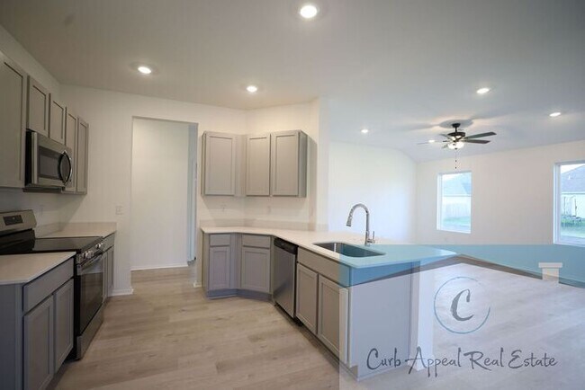 Building Photo - $950 Move in special!! New construction in...